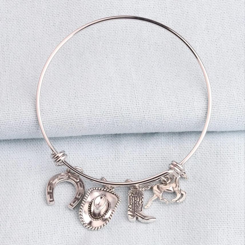 PULSERA ACERO VAQUERA CON CHARMS BOTA, SOMBRERO, HERRADURA