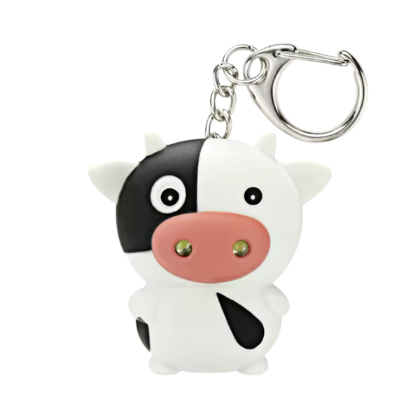 Llavero con luz y sonido de vaca