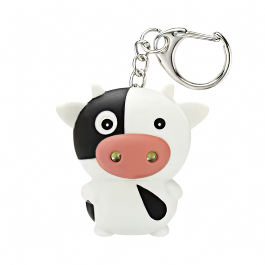 Llavero con luz y sonido de vaca