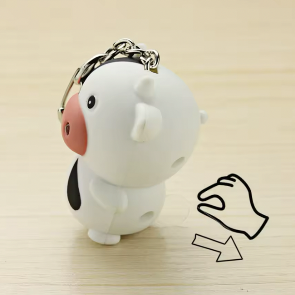 Llavero con luz y sonido de vaca