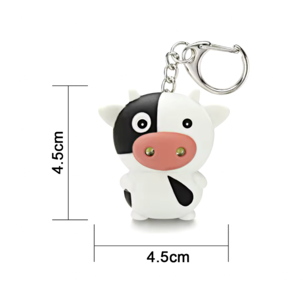 Llavero con luz y sonido de vaca