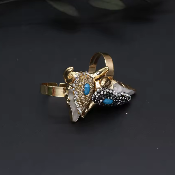 ANILLO TORO CHAPADO EN ORO 18 KILATES CON CRISTALES Y TURQUESA