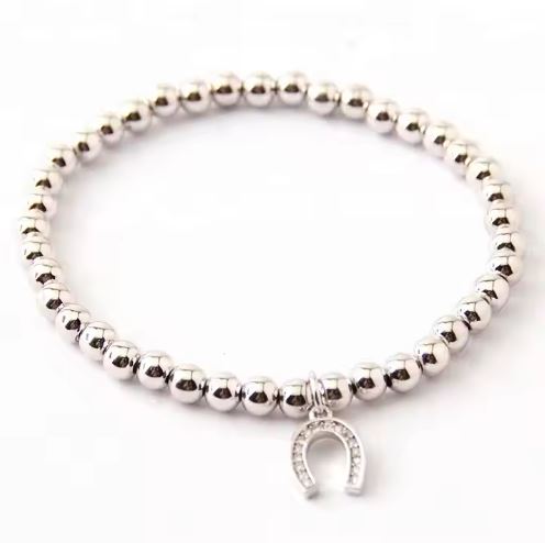 PULSERA CHAPA DE ORO CON HERRADURA FINA